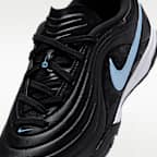 Tacos de fútbol para pasto artificial (turf) de corte low para niños grandes Nike Jr. Tiempo Maestro Academy