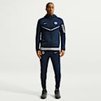 Chelsea F.C. Tech Men's Nike Fleece Windrunner Football Jacket with Reflective Design Accents