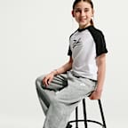 Pants holgados con dobladillo abierto para niños Nike Sportswear
