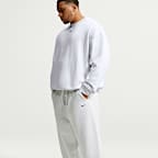 Pants con puños para hombre Nike Solo Fleece