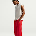 Pants de básquetbol Therma-FIT cepillados con dobladillo abierto para hombre Nike Standard Issue