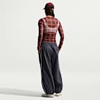 Tønneformet Nike Sportswear-bukse med mellomhøyt liv og ledig passform til dame