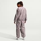 Pants de tenis de tiro medio holgados para mujer NikeCourt Court Collection