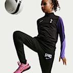 Dzianinowe spodnie piłkarskie dla dużych dzieci Nike Dri-FIT Tottenham Hotspur Strike (wersja trzecia)