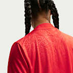 Playera de fútbol de manga corta Nike Dri-FIT para antes del partido para mujer USWNT Academy Pro