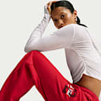Calças de bainha aberta de cintura normal de lã cardada de peso médio Nike Studio Fleece para mulher