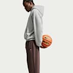 Pants de básquetbol Therma-FIT cepillados con dobladillo abierto para hombre Nike Standard Issue