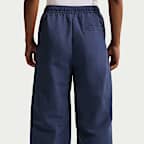 Pants de tiro medio con dobladillo abierto para mujer Nike Sportswear Everything Wovens