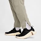 Pantalon avec ouvertures à zip Nike Dri-FIT Unlimited pour homme