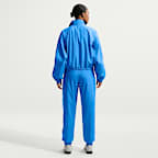 Joggers de tiro medio holgados con protección contra los rayos UV para mujer Nike Sportswear Classic Wovens