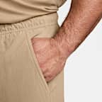 Shorts versátiles Dri-FIT de 18 cm sin forro para hombre Nike Unlimited