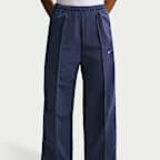 Pants de tiro medio con dobladillo abierto para mujer Nike Sportswear Everything Wovens
