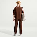 Pants de pierna entallada Dri-FIT de tiro alto con protección contra los rayos UV para mujer Nike 24.7 PerfectStretch