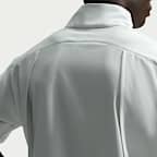 Playera cortavientos de golf de manga corta y ajuste holgado Dri-FIT para hombre Nike Tailored Performance