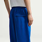 Pants de tejido Fleece con dobladillo abierto para hombre Nike Club