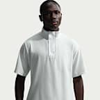 Playera cortavientos de golf de manga corta y ajuste holgado Dri-FIT para hombre Nike Tailored Performance
