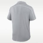Polo universitaria Nike Dri-FIT para hombre Michigan Par