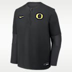 Playera rompevientos de manga larga universitaria Nike Dri-FIT con cierre de 1/4 para hombre Oregon Dugout