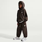 Luźne spodnie dla dużych dzieci (chłopców) Nike Sportswear