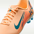 Tacos de fútbol MG low para niños talla grande Nike Jr. Mercurial Vapor 16 Club "Kylian Mbappé"