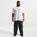 Pants cargo de tejido Woven con estampado integral para hombre Nike Air