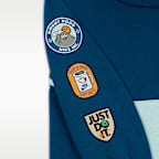 Conjunto de sudadera con gorro sin cierre y joggers de tejido Fleece para bebé (12-24 meses) Nike