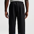 Calças de basquetebol escovadas Nike Standard Issue para homem