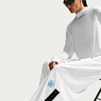Pants de tejido Knit de poliéster de tiro medio y pierna ancha holgados para mujer Nike Sportswear