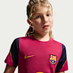F.C. Barcelona Strike Older Kids' Nike Football Dri-FIT Short-Sleeve Top