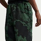 Pants cargo de tejido Woven con estampado integral para hombre Nike Air
