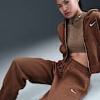 Pants de entrenamiento oversized de tiro alto para mujer Nike Sportswear Phoenix Fleece