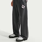 Pantaloni in fleece con orlo aperto Nike Solo Swoosh – Uomo