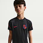 Playera de fútbol de manga corta Nike Dri-FIT para niños talla grande USMNT Strike
