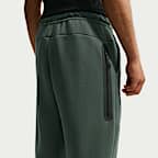 Pants de tejido Fleece con dobladillo abierto para hombre Nike Tech