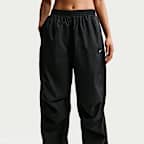 Pants ligeros de tiro medio con protección UV para mujer Nike Sportswear