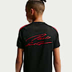 Paris Saint-Germain Strike Older Kids' Nike Football Dri-FIT Short-Sleeve Top