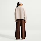 Pants de tiro alto de pierna ancha para mujer Nike 24.7 ImpossiblySoft