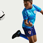 Przedmeczowa koszulka piłkarska z krótkim rękawem dla dużych dzieci Nike Dri-FIT Chorwacja 2026