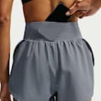 Shorts da running 2 in 1 a vita alta Dri-FIT Nike Flow – Donna