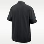 Chamarra de manga corta Nike de la NFL con gorro y medio cierre para hombre Carolina Panthers Sideline Coach