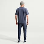 Calças desportivas de lã cardada Nike Tech para homem