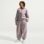 Pants de tenis de tiro medio holgados para mujer NikeCourt Court Collection