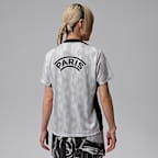 Paris Saint-Germain Academy Pro Night Edition Jordan Dri-FIT mérkőzés előtti, rövid ujjú női futballfelső
