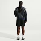 Chamarra oversized Naomi Osaka