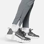 Pantalon avec ouvertures à zip Nike Dri-FIT Unlimited pour homme