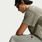 Męskie dzianinowe spodnie z nogawkami bez ściągaczy Nike Sportswear