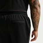 Pantaloni in fleece con orlo aperto Nike Club – Uomo