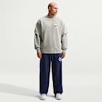 Nike Solo Swoosh Pantalón de tejido Fleece con dobladillo abierto - Hombre
