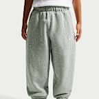 Nike Solo Swoosh fleece basketbalbroek met boorden voor kinderen