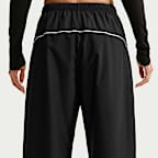 Pants deportivos de tiro alto holgados para mujer Nike Sportswear